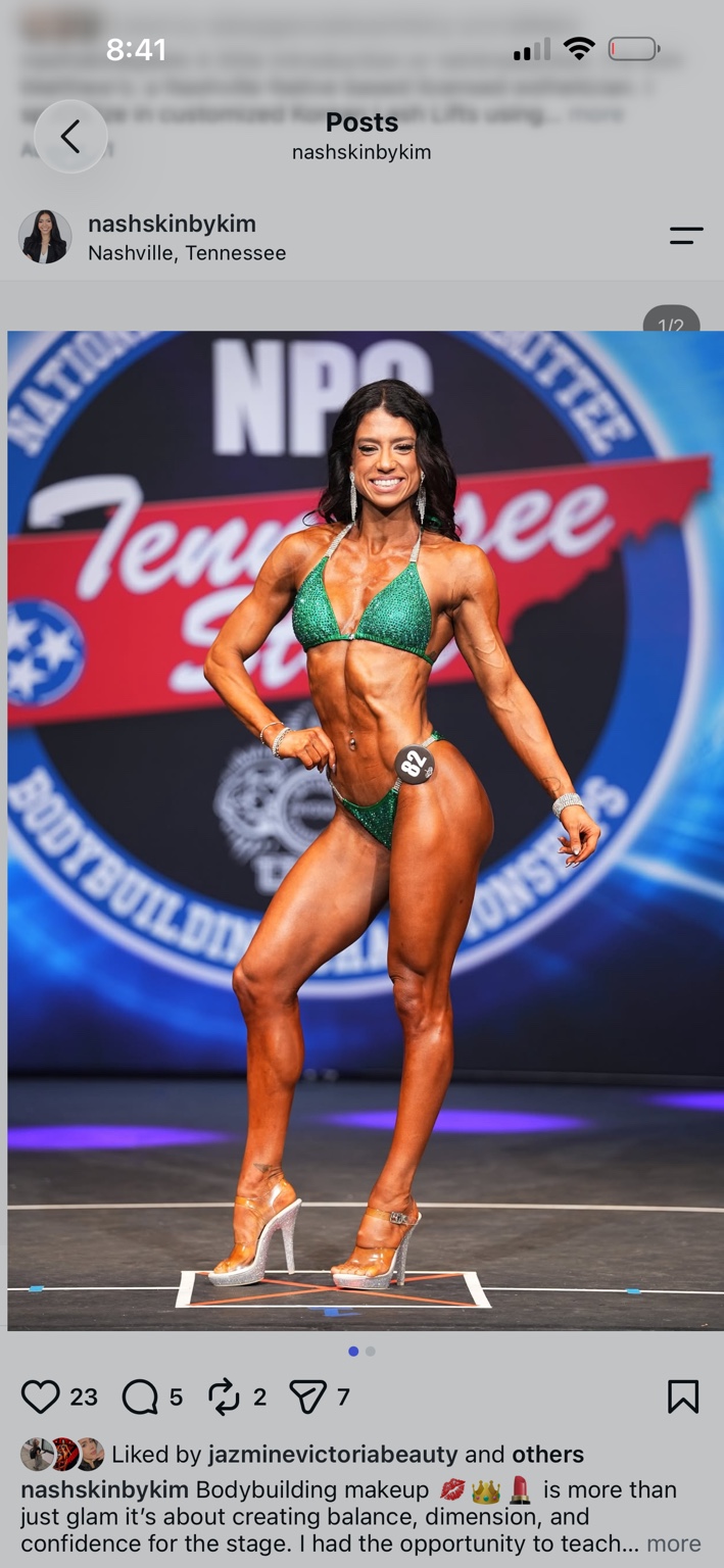 Bodybuilding athlete wearing competition makeup